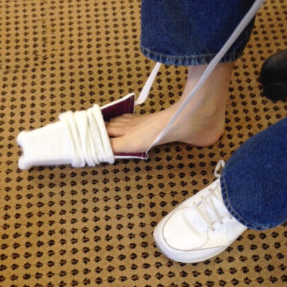 Terry Cloth Sock Aid with Web Handles In Use